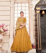 Mustard Embroidered Silk Blend Semi Stitched Lehenga Choli