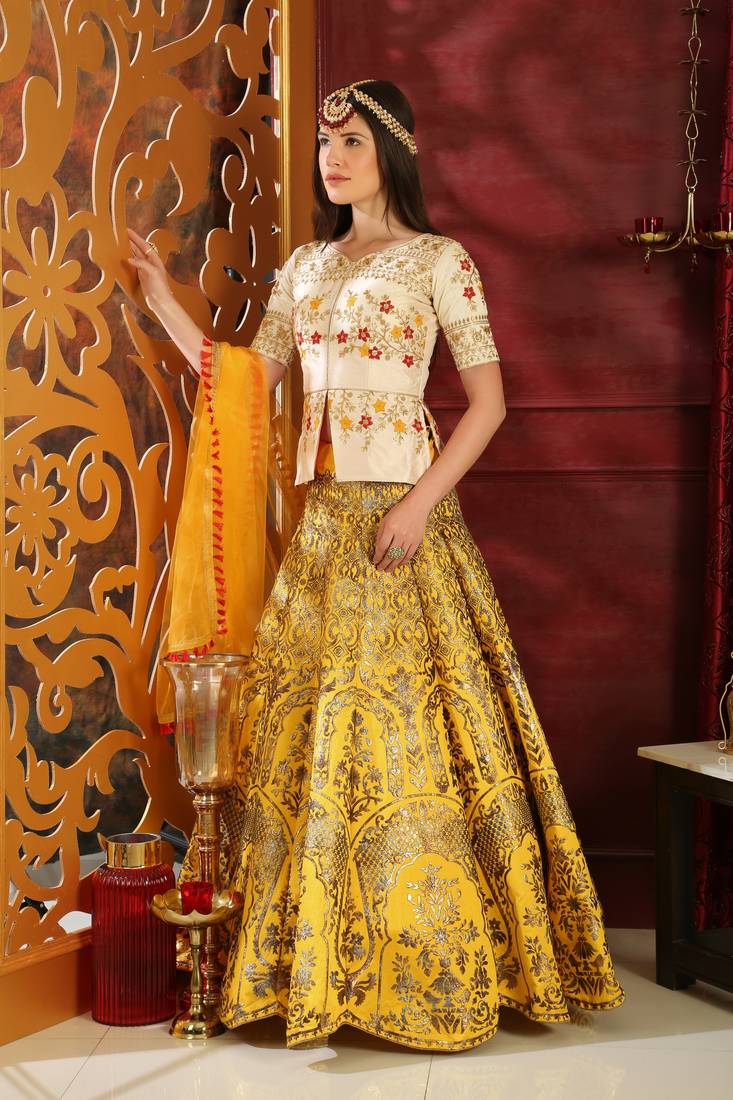 Yellow Embroidered Silk Blend Semi Stitched Lehenga Choli