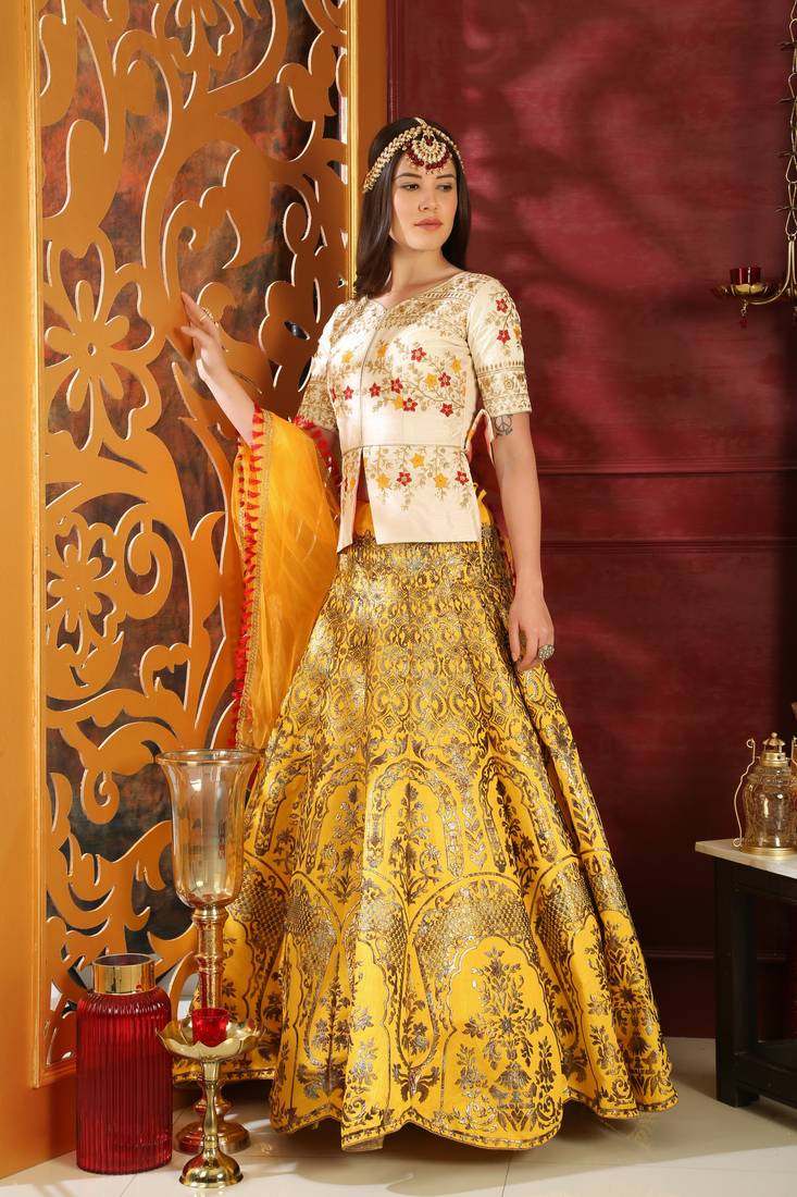Yellow Embroidered Silk Blend Semi Stitched Lehenga Choli