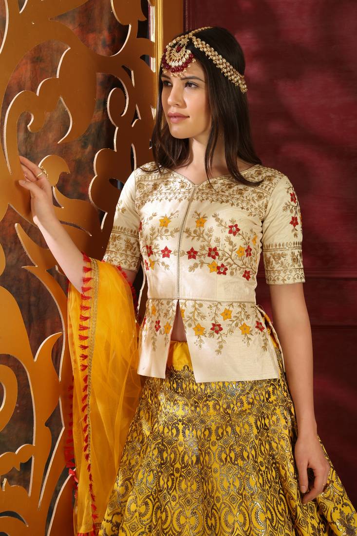 Yellow Embroidered Silk Blend Semi Stitched Lehenga Choli