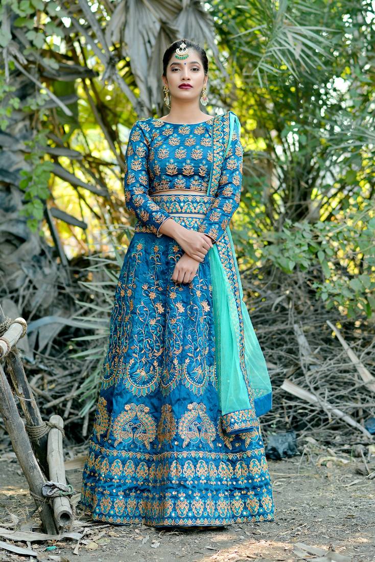 Turquoise Embroidered Silk Blend Semi Stitched Lehenga Choli