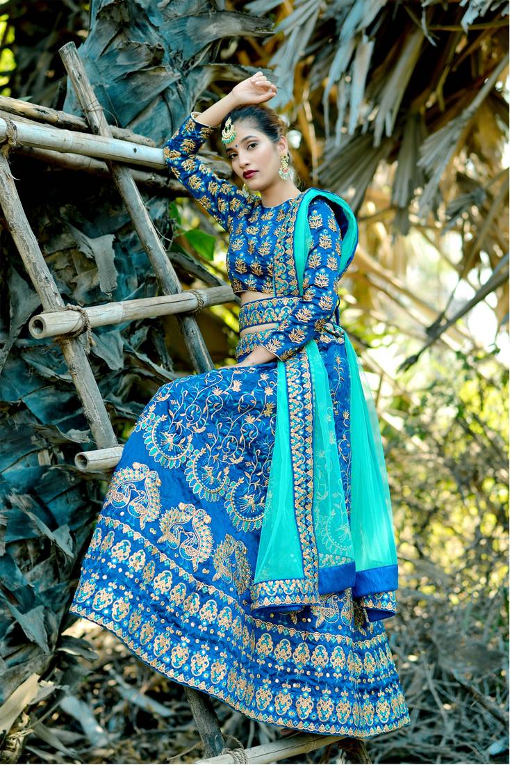 Turquoise Embroidered Silk Blend Semi Stitched Lehenga Choli