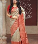 Beige woven banarasi silk blend saree with blouse