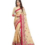Cream embroidered chiffon saree with blouse