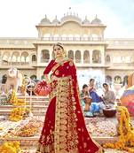 Red embroidered georgette saree with blouse