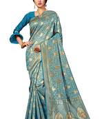 Turquoise woven banarasi silk blend saree with blouse