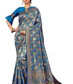 Turquoise woven banarasi silk blend saree with blouse