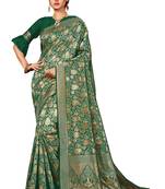 Green woven banarasi silk blend saree with blouse