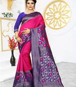 Rani pink woven banarasi silk saree with blouse