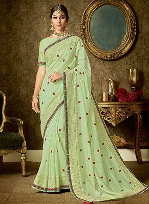 Light green embroidered organza saree with blouse 1