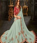 Light sea green embroidered tissue saree with blouse