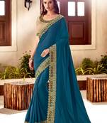 Teal embroidered silk blend saree with blouse