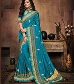 Blue embroidered silk blend saree with blouse