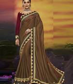 Brown embroidered silk blend saree with blouse