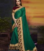 Green embroidered silk blend saree with blouse