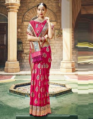 Pink woven silk blend saree with blouse 1