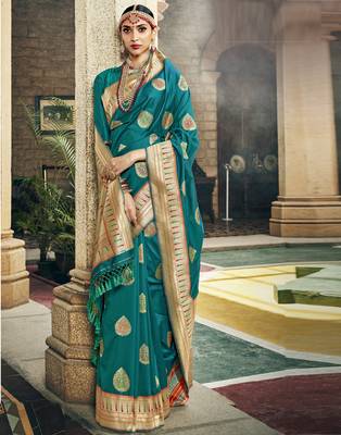 Green woven silk blend saree with blouse 1