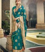 Green woven silk blend saree with blouse