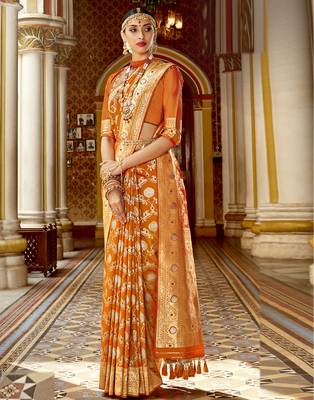 Orange woven silk blend saree with blouse 1