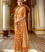Orange woven silk blend saree with blouse
