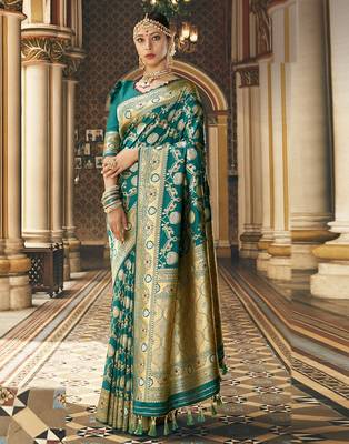 Green woven silk blend saree with blouse 1