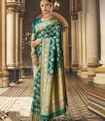 Green woven silk blend saree with blouse