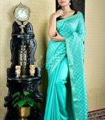 Cyan woven blended cotton saree with blouse