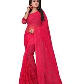 Dark pink embroidered net saree with blouse