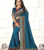 Teal embroidered art silk saree with blouse