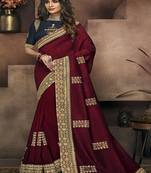 Wine embroidered satin saree with blouse