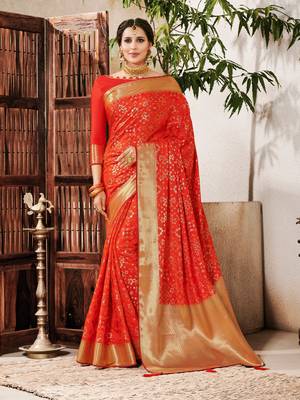 Orange woven silk saree with blouse 1