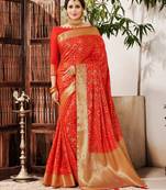 Orange woven silk saree with blouse