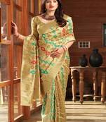 Beige woven banarasi silk saree with blouse