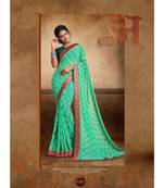 Turquoise Printed Georgette Saree With Blouse