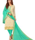 Cream & Turquoise Banarasi Cotton Dress Material Having Banarasi Dupatta With Tassels