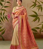 Orange embroidered silk blend saree with blouse