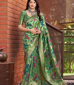 Green woven banarasi silk saree with blouse