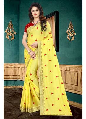 Yellow embroidered georgette saree with blouse 1
