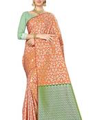 Orange woven banarasi saree with blouse