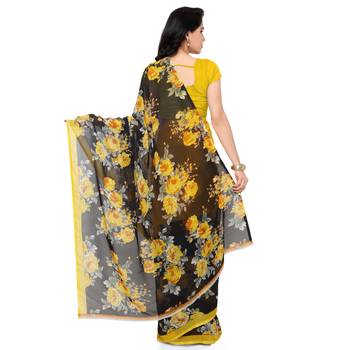 Yellow printed georgette saree with blouse 3