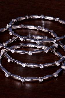 Rhodium Plated AAA CZ Stone Embellished Two Pairs of Designer Bangles BD405