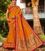 Orange embroidered banarasi silk saree with blouse