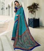 Turquoise printed crepe saree with blouse