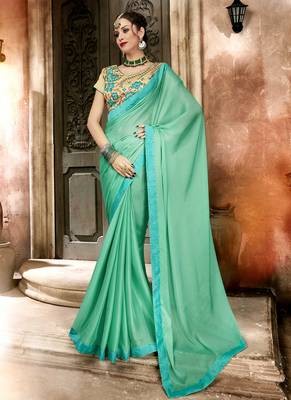 Sea green plain georgette saree with blouse 1