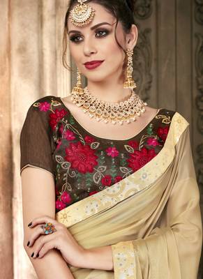Beige plain georgette saree with blouse 2