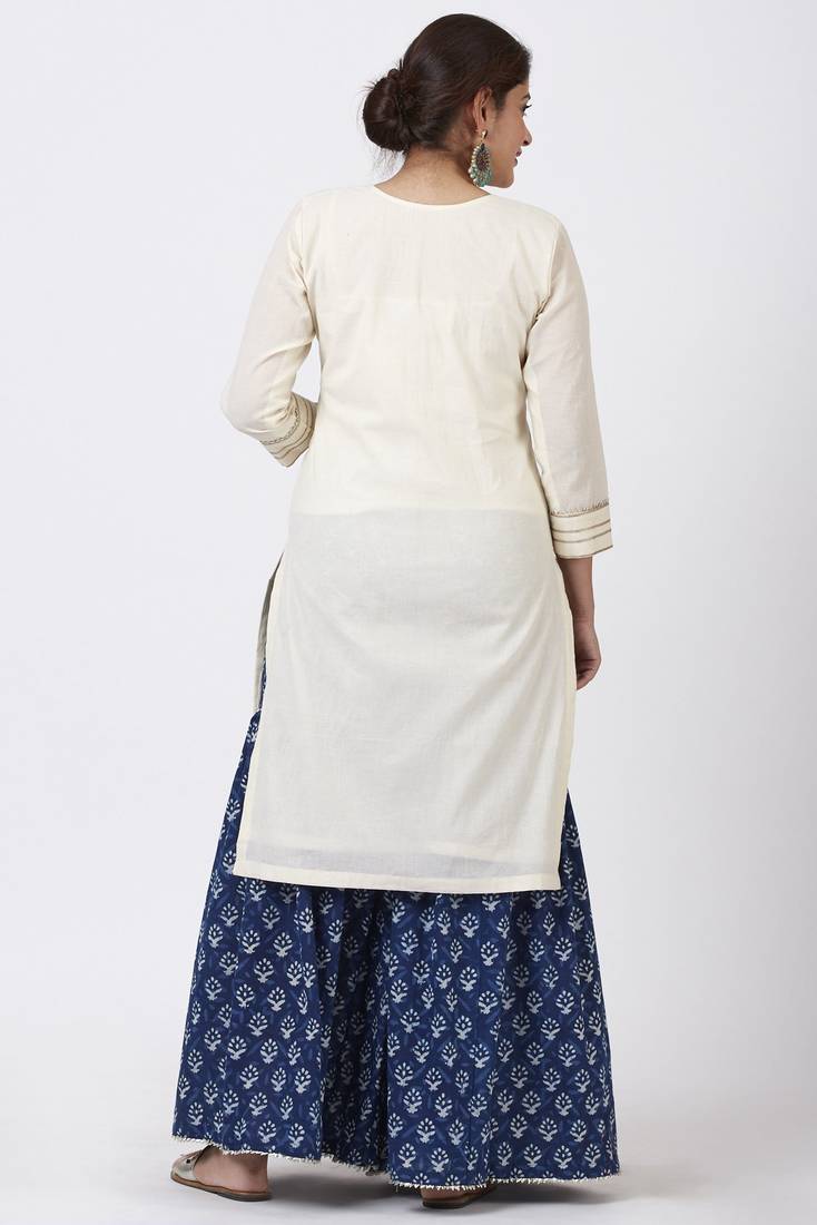Festive OffWhite Kurti with Indigo Festive Sharara and Pom Pom Cotton Dupatta