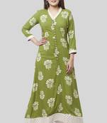 Pale Green Festive Kurti with Off-White Churidaar