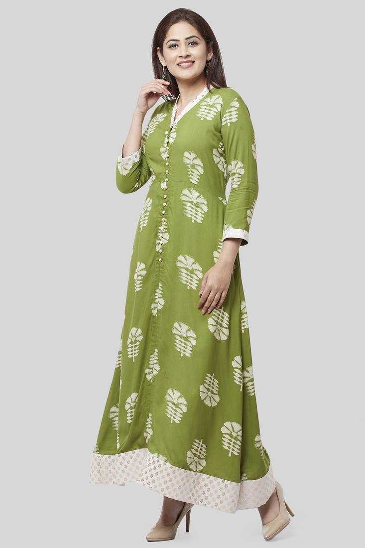 Pale Green Festive Kurti with Off-White Churidaar