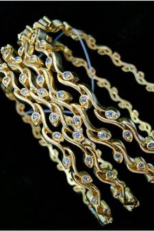 Georgeous High Gold Plated Bangle With American Diamond Stones
