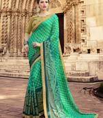 Sea green printed brasso saree with blouse